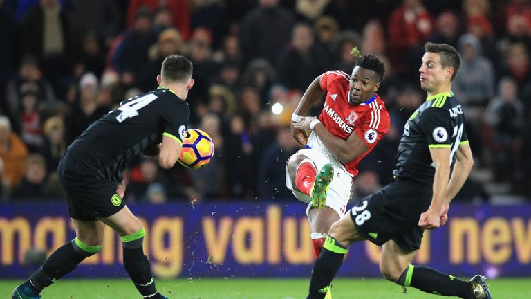 MIDDLESBROUGH, ENGLAND - NOVEMBER 20:  Adama Traore of Middlesbrough shoots on goal as Gary Cahill of Chelsea blocks during the Premier League match betwee