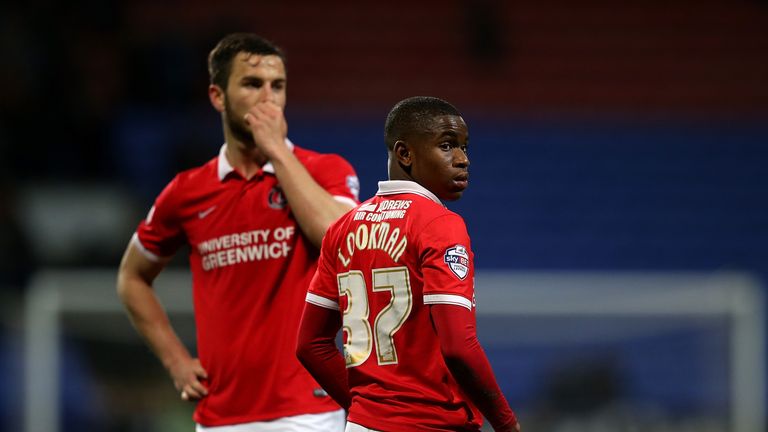 BOLTON, ENGLAND - APRIL 19:  Ademola Lookman of Charlton Athletic looks on at the end of the match as the travelling support shout abuse at the players dur