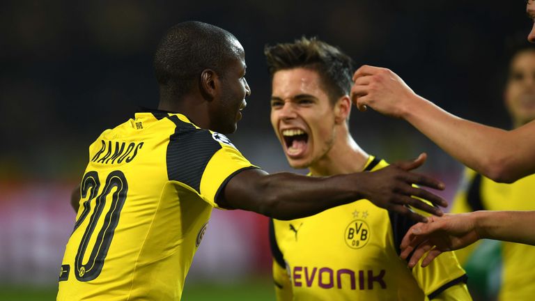 Dortmund's Columbian striker Adrian Ramos (L) celebrates scoring with team mates during the UEFA Champions League Group F football match between BVB Boruss