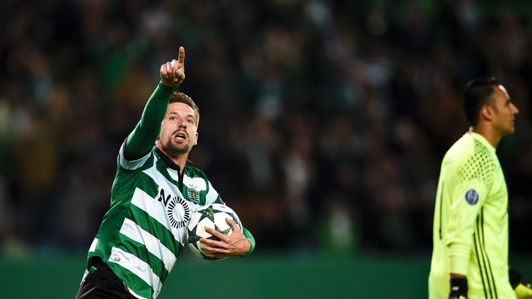 Sporting's midfielder Adrien Silva celebrates after scoring a penalty goal during the UEFA Champions League football match Sporting CP vs Real Madrid CF at