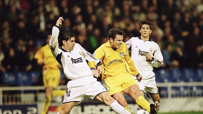 7 Mar 2001:  Mark Viduka of Leeds United has his shot blocked by Aitor Karanka of Real Madrid during the UEFA Champions League Group D match played at the 