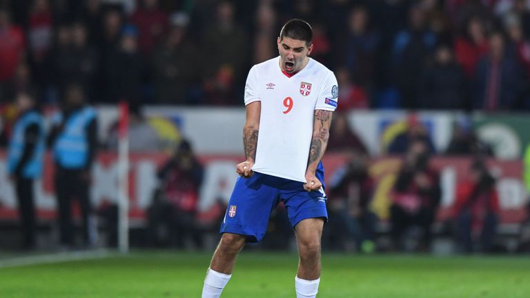 Serbia's striker Aleksandar Mitrovic celebrates after scoring their first goal during the World Cup 2018 qualification match between Wales and Serbia at Ca
