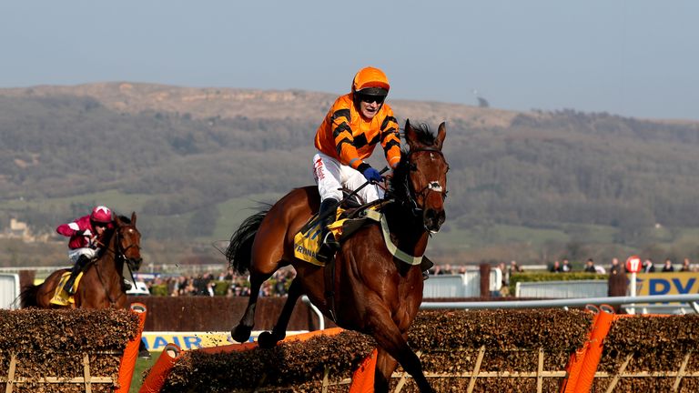 Thistlecrack ridden by jockey Tom Scudamore on the way to winning the Ryanair World Hurdle