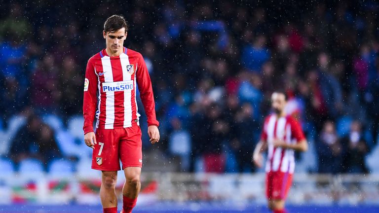 SAN SEBASTIAN, SPAIN - NOVEMBER 05:  Antoine Griezmann of Club Atletico de Madrid reacts dejected after William Jose of Real Sociedad de Futbol scored his 