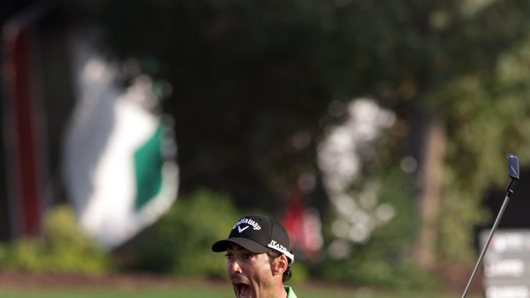 DUBAI, UNITED ARAB EMIRATES - DECEMBER 11:  Alvaro Quiros of Spain celebrates on the 18th green after the final round of the Dubai World Championship on th