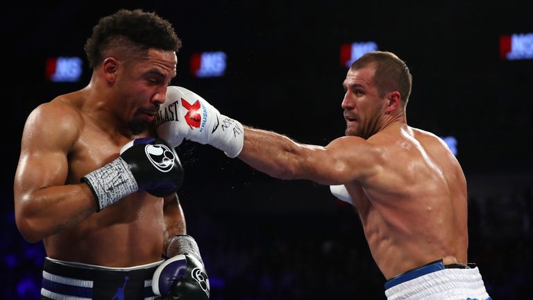 Sergey Kovalev of Russia lands a left to the head of Andre Ward during the second round