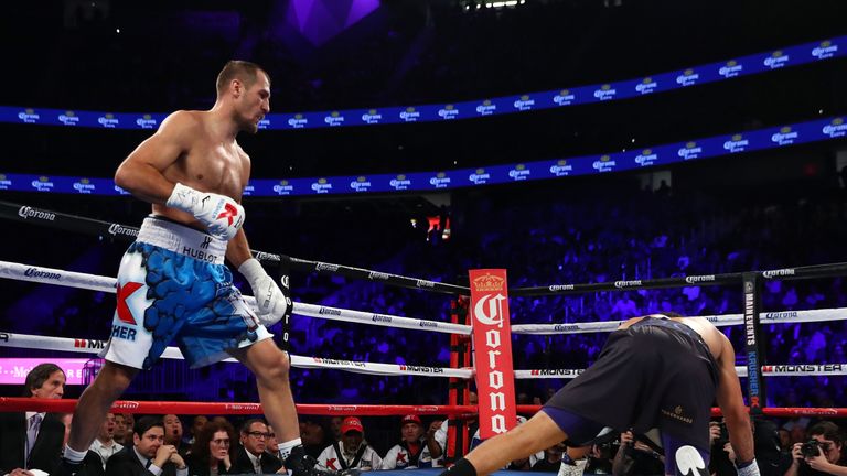 Sergey Kovalev of Russia knocks down Andre Ward during the second round of their light heavyweight title bout