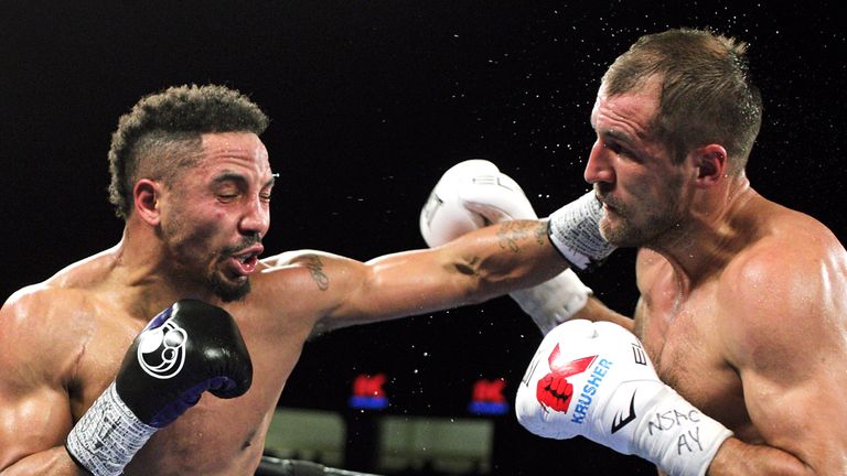 Andre Ward of the US (L) throws a left at Sergey Kovalev