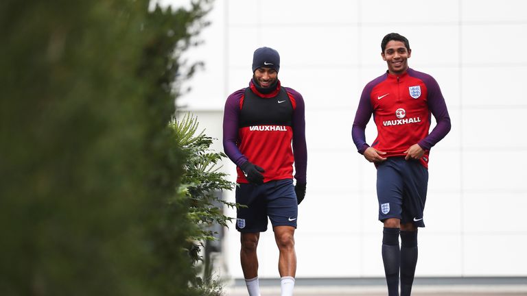 Tottenham youth player Dylan Duncan walks to an England training session with  Andros Townsend