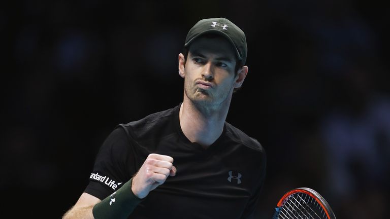 LONDON, ENGLAND - NOVEMBER 18:  Andy Murray of Great Britain celebrates winning the first set in his men's singles match against Stan Wawrinka of Switzerla