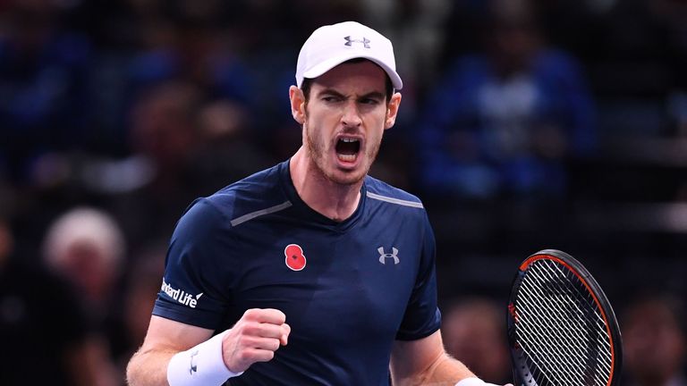 Britain's Andy Murray celebrates after winning a tie-break to win the first set during his quarter-final tennis match against Czech Republic's Tomas Berdyc