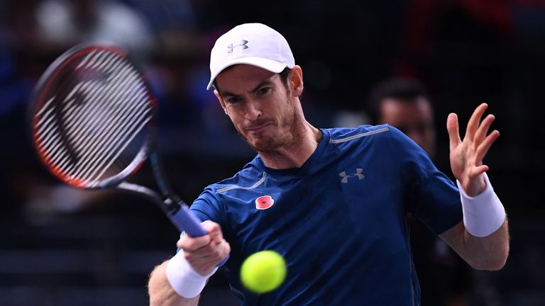 Britain's Andy Murray returns the ball to Czech Republic's Tomas Berdych during their quarter-final tennis match at the ATP World Tour Masters 1000 indoor 