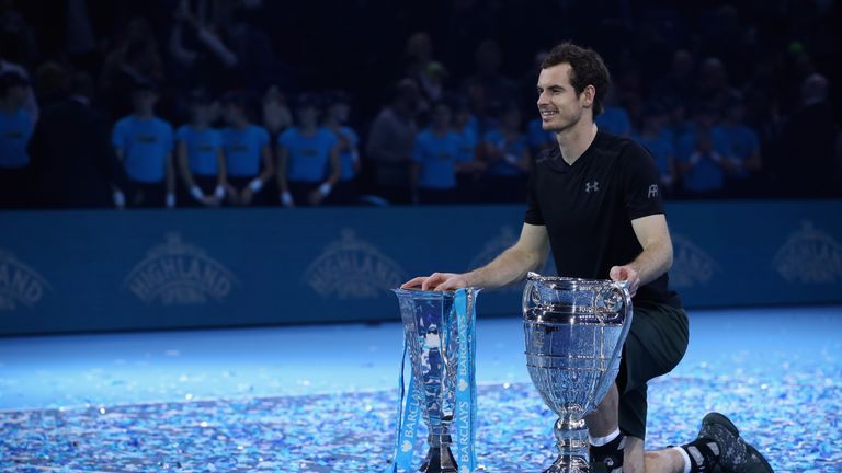 Murray poses with the ATP Tour Finals trophy and the year end world No 1 trophy