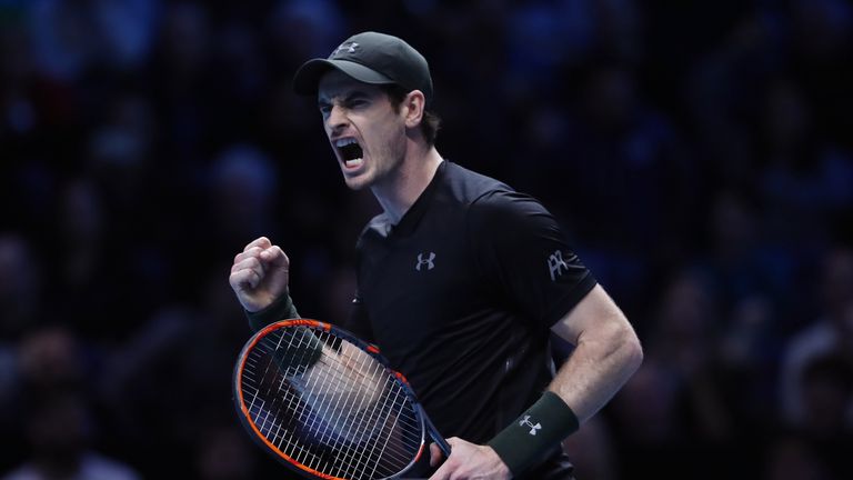  Andy Murray of Great Britain celebrates a point during the Singles Final against Novak Djokovic of Serbia at the O2 