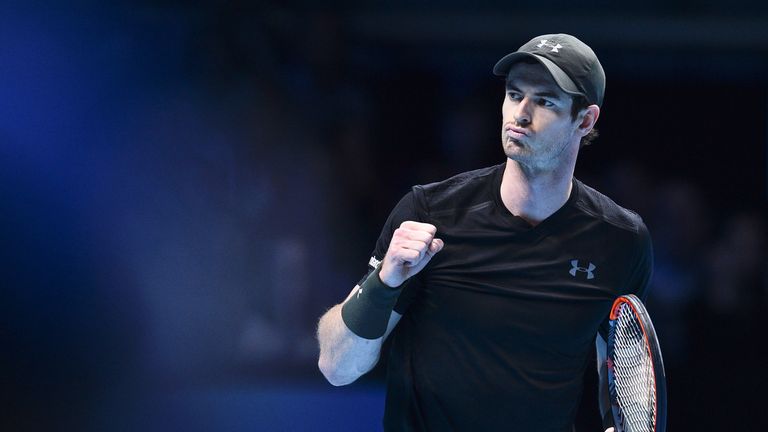 Andy Murray celebrates victory over Stan Wawrinka at the O2
