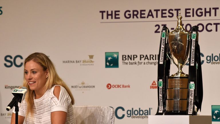 Angelique Kerber of Germany attends a press conference prior to the WTA Finals at Marina Bay Sands in Singapore on October 22, 2016.  / AFP / ROSLAN RAHMAN
