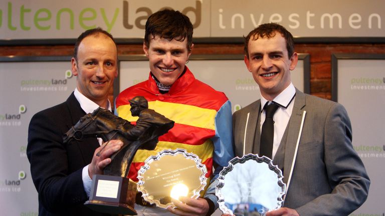 Anthony Knott owner of Hunt Ball (left), jockey Nick Schofield and trainers Keiran Burke after their victory in the Pulteney Land Investments Novices Handi