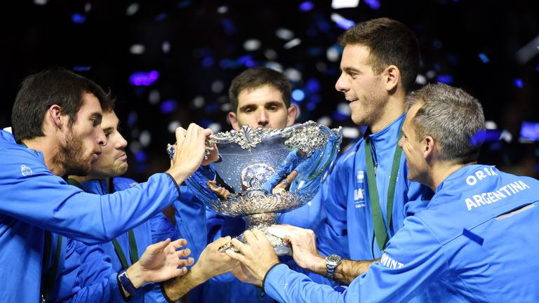  Leonardo Mayer, Guido Pella, Federico Delbonis, Juan martin del Potro and coach coach Daniel Orsanic celebrate with the trophy 