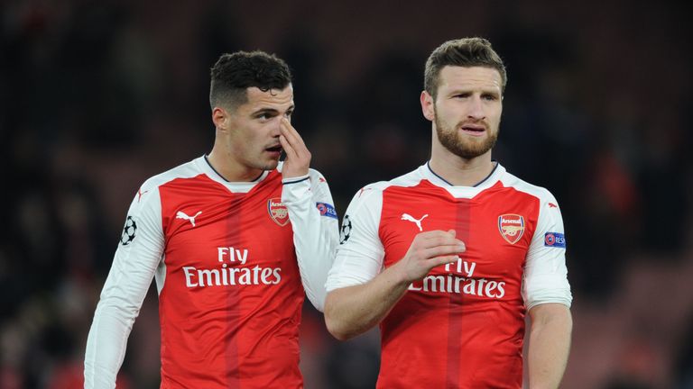 Xhaka and Mustafi of Arsenal during the UEFA Champions League match against Paris Saint-Germain at Emirates Stadium on November 23, 2016