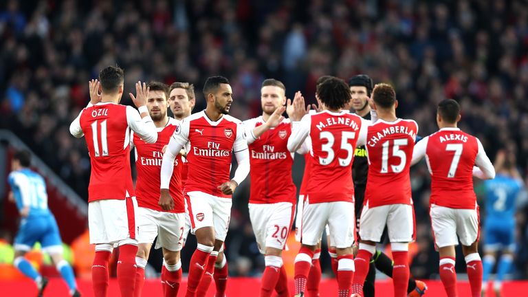 The Arsenal team embrace prior to kick-off against Bournemouth