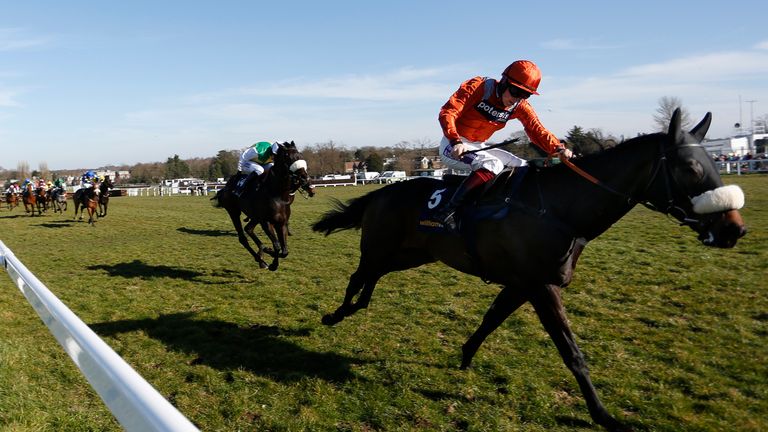 Sam Twiston-Davies riding As De Mee clear the last to win the EBF Fund William Hill 'National Hunt' Novices' Handicap Hurdle at Sandown
