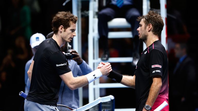 The defeated  Andy Murray shakes hands with Stan Wawrinka