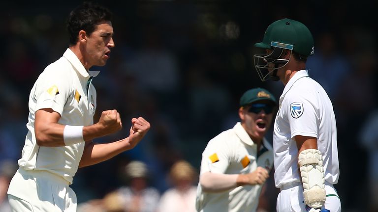 Mitchell Starc celebrates the wicket of Stephen Cook