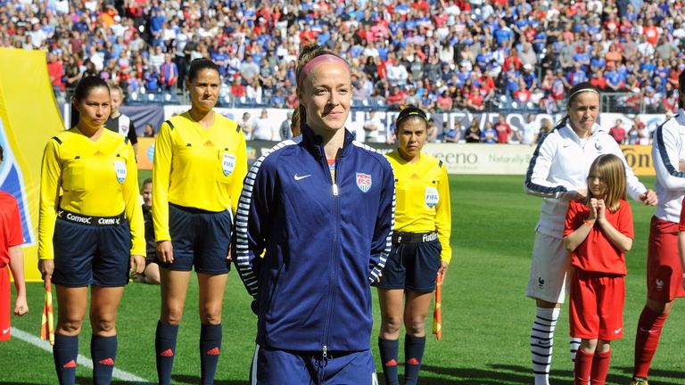 NASHVILLE, TENNESSEE - MARCH 06:  Becky Sauerbrunn #4 of USA is honored for playing in her 100th game for the USA prior to an international friendly match 