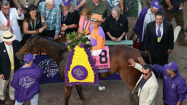 ARCADIA, CA - NOVEMBER 04:  Jockey Gary Stevens riding Beholder celebrates after winning the Longines Breeders' Cup Distaff during day one of the 2016 Bree