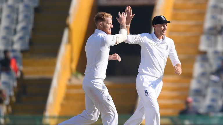 England bowler Ben Stokes (L) celebrates with his teammate Joe Root after he dismissed India batsman R. Ashwin during the third day of the third Test crick