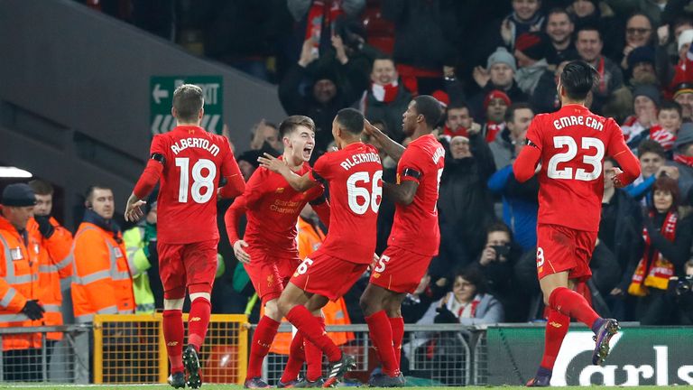 Liverpool's Ben Woodburn celebrates scoring his side's second goal of the game with team-mates during the EFL Cup, Quarter Final v Leeds at Anfield