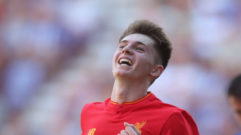 Ben Woodburn of Liverpool celebrates after scoring the second goal during a pre-season friendly between Wigan Athletic in July 2016