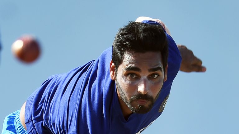 Indian cricketer Bhuvneshwar Kumar delivers a ball while practicing at the end of the three-day tour match between India and WICB President's XI squad at t
