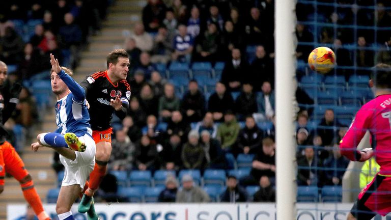 Sheffield United's Billy Sharp heads home