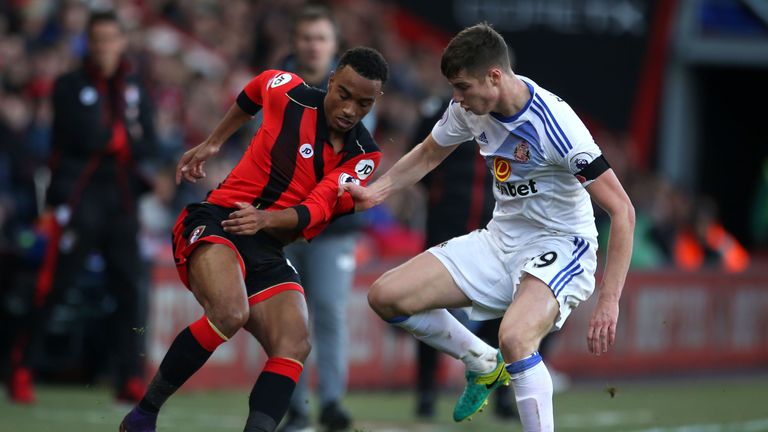 Junior Stanislas takes on Paddy McNair 