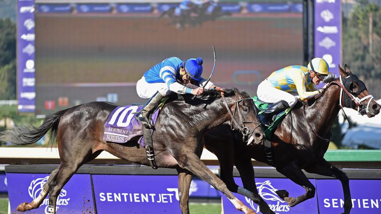 Classic Empire and Julien Leparoux hold off Not This Time to win the Sentient Jet Breeders' Cup Juvenile.