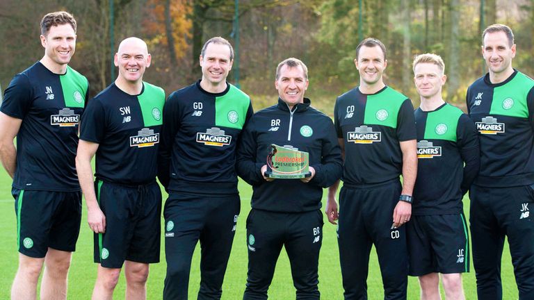 Celtic boss Brendan Rodgers and his coaching staff with the award