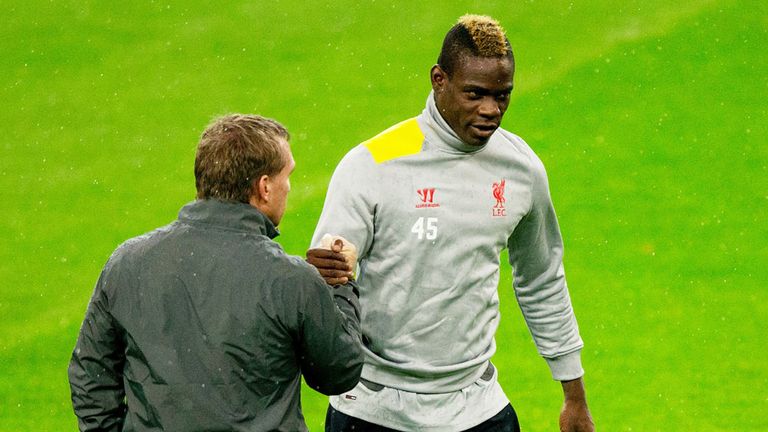 Brendan Rodgers (L) and Mario Balotelli before a Liverpool match in 2014