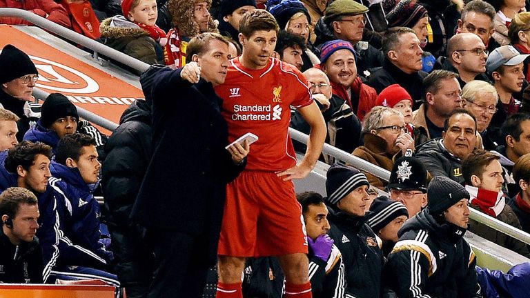 Brendan Rodgers gives instructions to Steven Gerrard during a Liverpool match