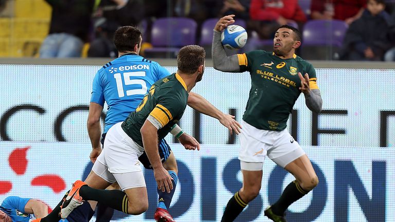 Bryan Habana of South Africa breaks with the ball against Italy