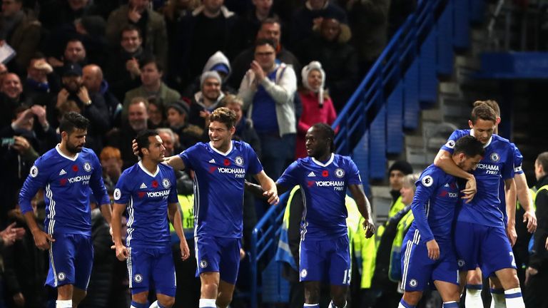 LONDON, ENGLAND - NOVEMBER 05: Pedro of Chelsea celebrates scoring his sides fifth goal with his Chelsea team mates during the Premier League match between