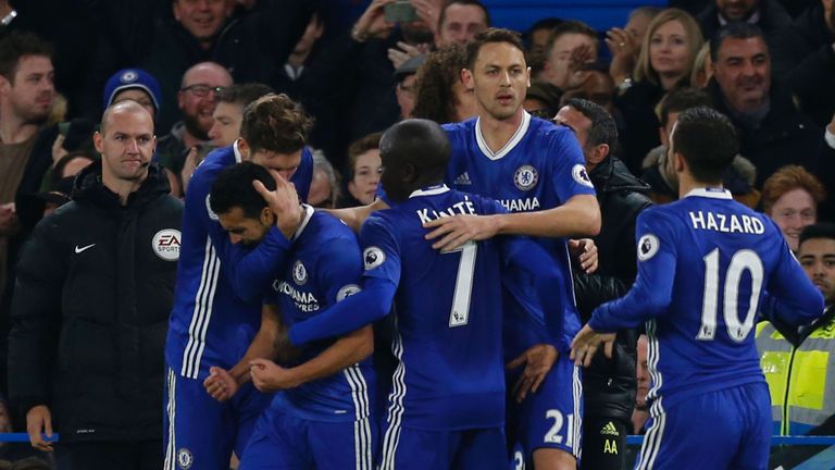 Chelsea midfielder Pedro (2L) celebrates scoring their first goal to equalise