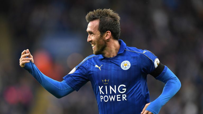 LEICESTER, ENGLAND - OCTOBER 22:  Christian Fuchs of Leicester City celebrates scoring his sides third goal during the Premier League match between Leicest