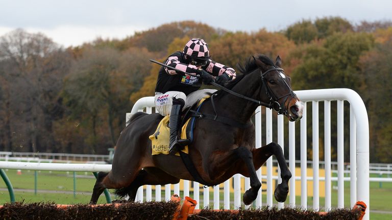 Ch'tibello and Harry Skelton clear the last flight to win the Betfair Price Rush Hurdle at Haydock.