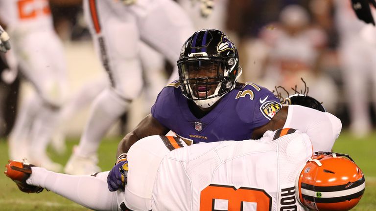 BALTIMORE, MD - NOVEMBER 10: Inside linebacker C.J. Mosley #57 of the Baltimore Ravens sacks quarterback Kevin Hogan #8 of the Cleveland Browns in the firs