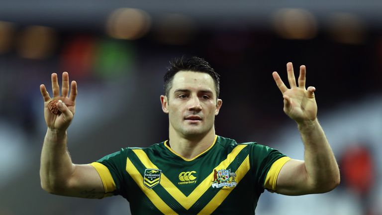 Cooper Cronk celebrates victory in the Four Nations match between England and Australia 