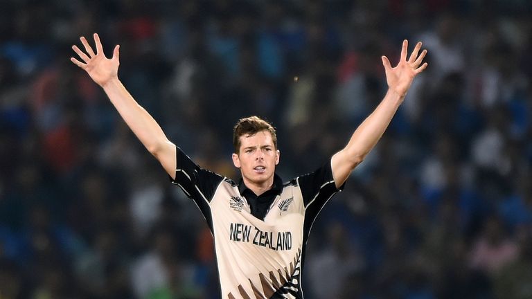 Bowler Mitchell Santner celebrates taking a wicket for New Zealand
