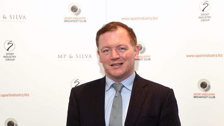 Damian Collins MP poses for photographs during the Sport Industry Breakfast Club on March 10 2016