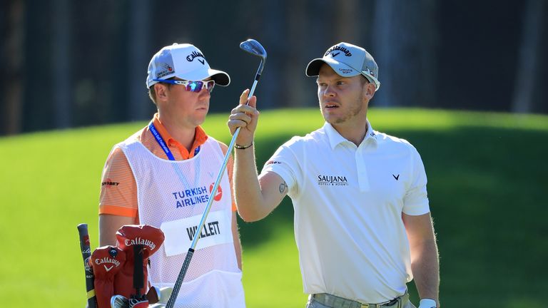 ANTALYA, TURKEY - NOVEMBER 04:  Danny Willett of England selects a club on the 1st hole during day two of the Turkish Airlines Open at the Regnum Carya Gol