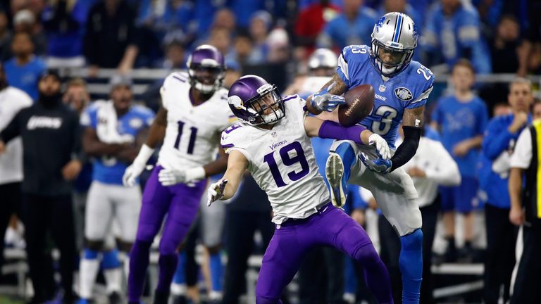 DETROIT.MI - NOVEMBER 24: Darius Slay (23) of the Detroit Lions intercepts a pass in front of Adam Thielen (19) of the Minnesota Vikings with 30 seconds le